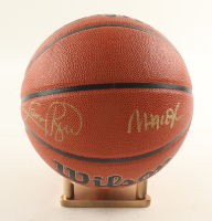 Larry Bird & Magic Johnson Signed NBA Basketball With Display Stand (PSA & Beckett) at PristineAuction.com