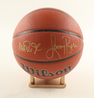Larry Bird & Magic Johnson Signed NBA Basketball With Display Stand (PSA & Beckett) at PristineAuction.com