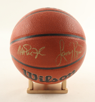 Larry Bird & Magic Johnson Signed NBA Basketball With Display Stand (PSA & Beckett) at PristineAuction.com