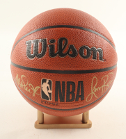 Larry Bird & Magic Johnson Signed NBA Basketball With Display Stand (PSA & Beckett) at PristineAuction.com