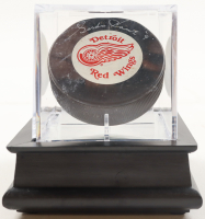 Gordie Howe Signed Detroit Red Wings Logo Hockey Puck with Display Case (PSA) at PristineAuction.com