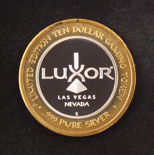 Luxor Casino $10 .999 Pure Silver Gaming Token at PristineAuction.com Luxor Casino $10 .999 Pure Silver Gaming Token at PristineAuction.com
