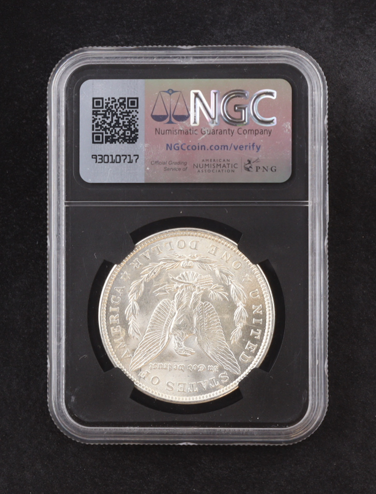 1921 Morgan Silver $1 Dollar - Original Bag Fragment Relic (NGC BRILLIANT UNCIRCULATED) at PristineAuction.com 1921 Morgan Silver $1 Dollar - Original Bag Fragment Relic (NGC BRILLIANT UNCIRCULATED) at PristineAuction.com