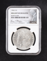 1904-O Morgan Silver $1 Dollar - George T. Morgan Signature Label (NGC BRILLIANT UNCIRCULATED) at PristineAuction.com