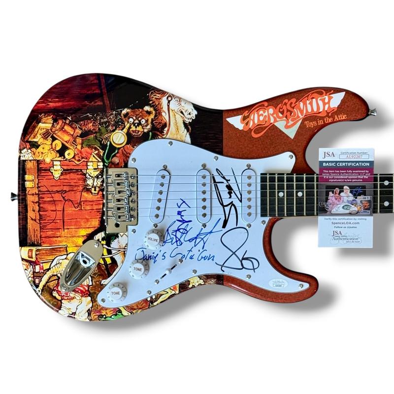 Aerosmith Custom Stratocaster Guitar Band-Signed By (5) with Steven Tyler, Joe Perry, Brad Whitford, Tom Hamilton & Joey Kramer (JSA) at PristineAuction.com Aerosmith Custom Stratocaster Guitar Band-Signed By (5) with Steven Tyler, Joe Perry, Brad Whitford, Tom Hamilton & Joey Kramer (JSA) at PristineAuction.com