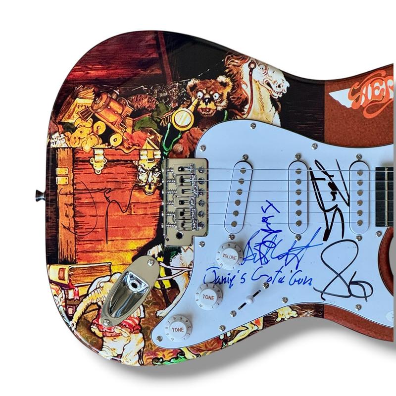 Aerosmith Custom Stratocaster Guitar Band-Signed By (5) with Steven Tyler, Joe Perry, Brad Whitford, Tom Hamilton & Joey Kramer (JSA) at PristineAuction.com Aerosmith Custom Stratocaster Guitar Band-Signed By (5) with Steven Tyler, Joe Perry, Brad Whitford, Tom Hamilton & Joey Kramer (JSA) at PristineAuction.com