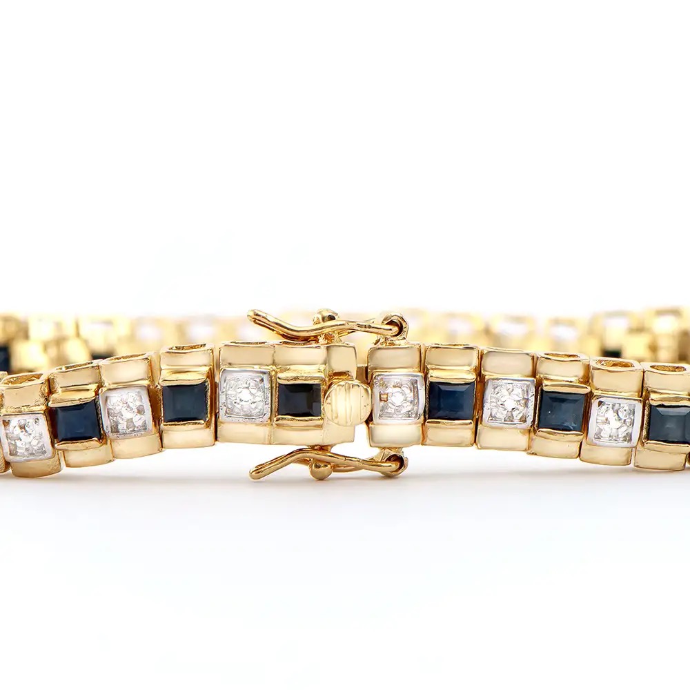 5.29 CTW Black Sapphire & Diamonds 18K Gold Plated Designer Bracelet Size 7.7 Inches| Estimated Retail Value: $1,929 (AMG) at PristineAuction.com 5.29 CTW Black Sapphire & Diamonds 18K Gold Plated Designer Bracelet Size 7.7 Inches| Estimated Retail Value: $1,929 (AMG) at PristineAuction.com