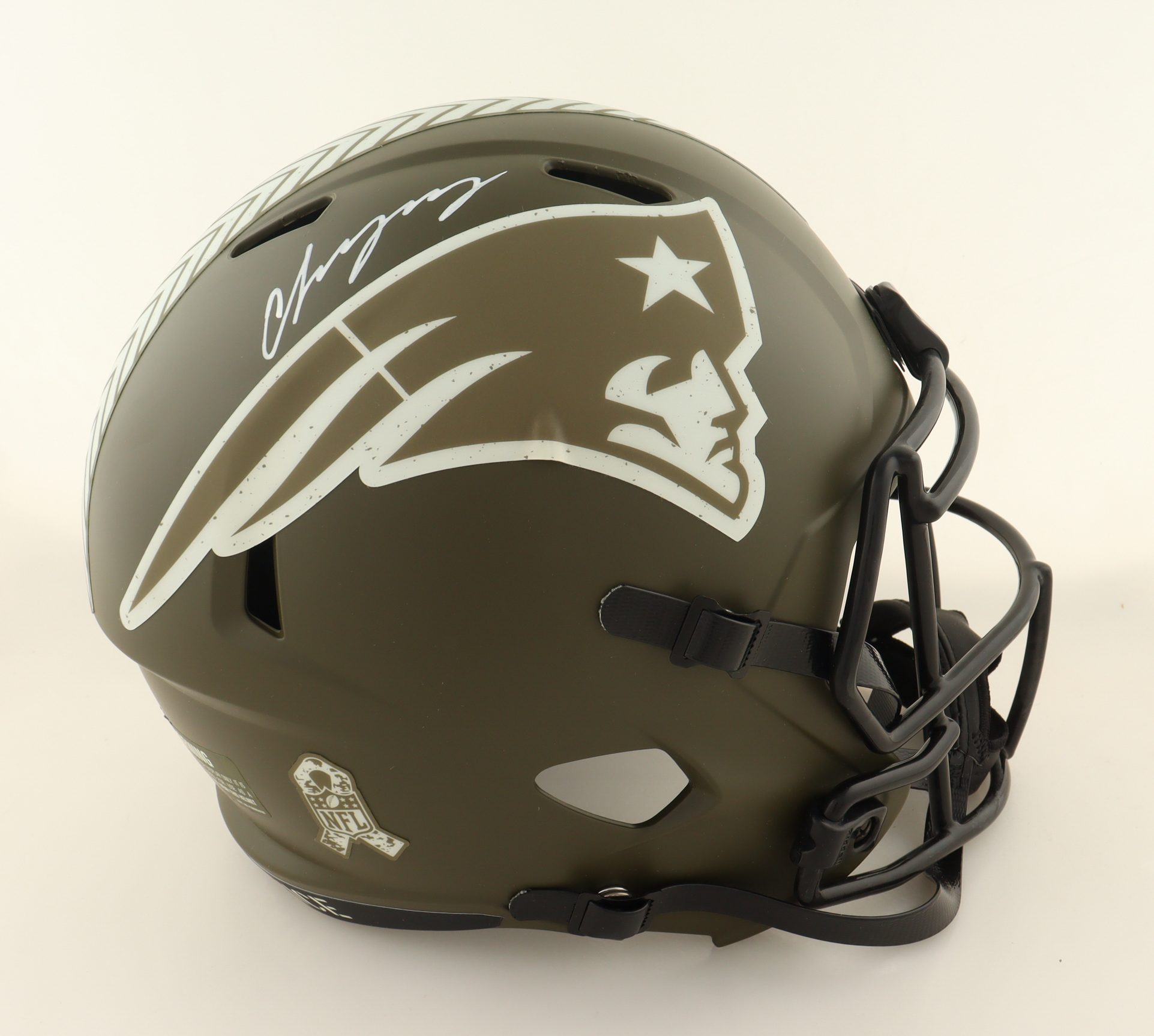 Christian Gonzalez Signed Patriots Full-Size Salute To Service Alternate Speed Helmet (Beckett) at PristineAuction.com Christian Gonzalez Signed Patriots Full-Size Salute To Service Alternate Speed Helmet (Beckett) at PristineAuction.com