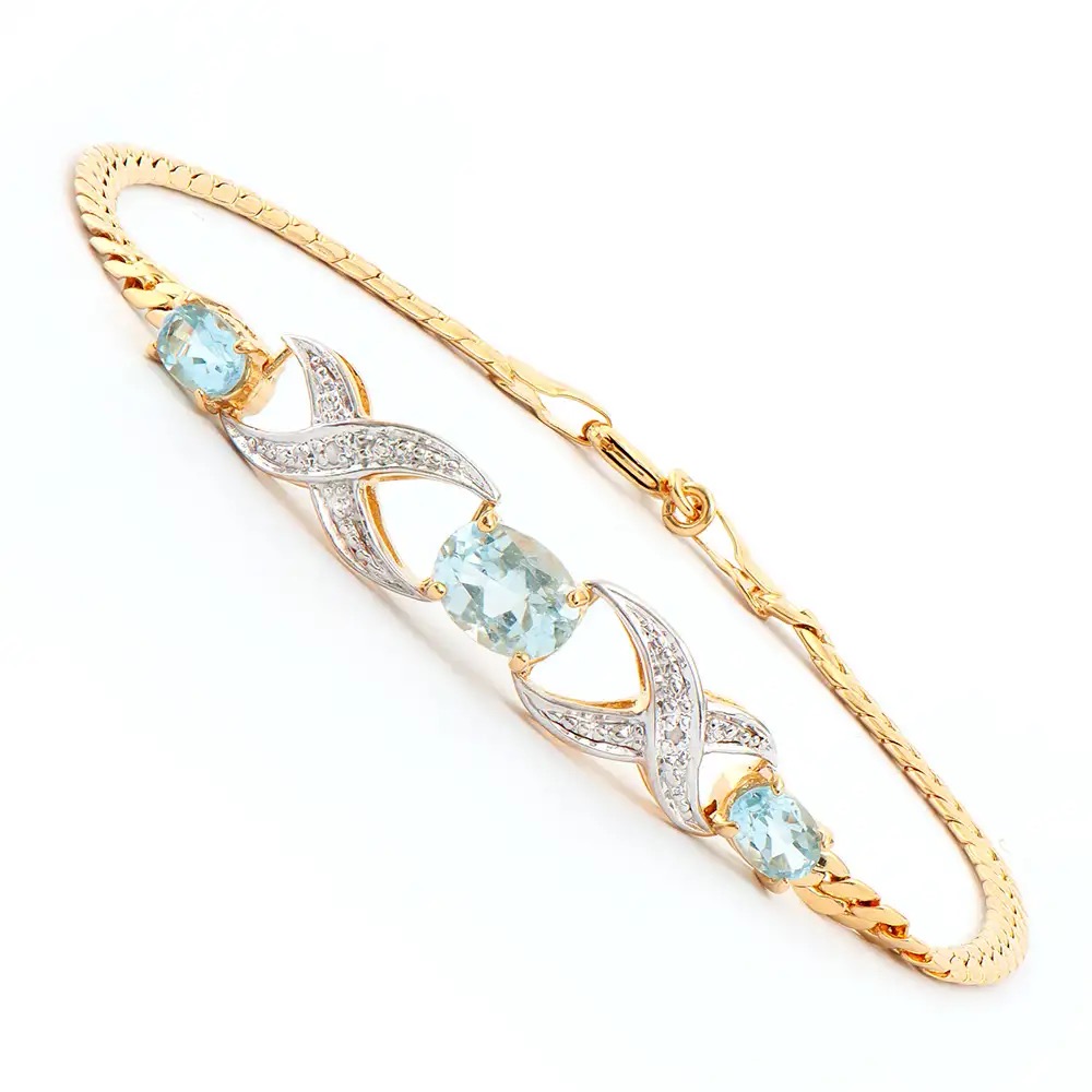 2.29 CTW Blue Topaz & Diamond 18K Gold Plated Designer Bracelet Size 7.75 Inches | Estimated Retail Value: $1,789 (AMG) at PristineAuction.com 2.29 CTW Blue Topaz & Diamond 18K Gold Plated Designer Bracelet Size 7.75 Inches | Estimated Retail Value: $1,789 (AMG) at PristineAuction.com