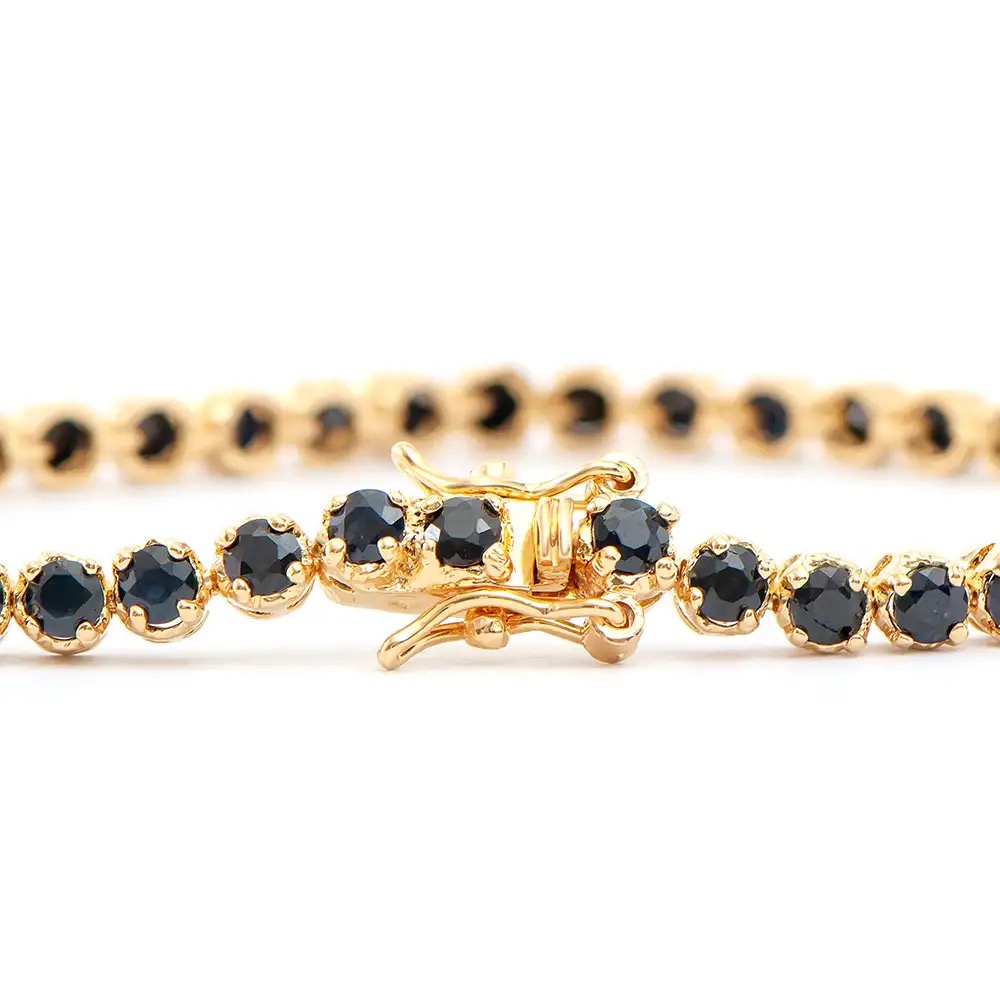 6.85 CTW Black Sapphire 18K Gold Plated Designer Bracelet 7.5 Inches | Estimated Retail Value: $1,879 (AMG) at PristineAuction.com 6.85 CTW Black Sapphire 18K Gold Plated Designer Bracelet 7.5 Inches | Estimated Retail Value: $1,879 (AMG) at PristineAuction.com