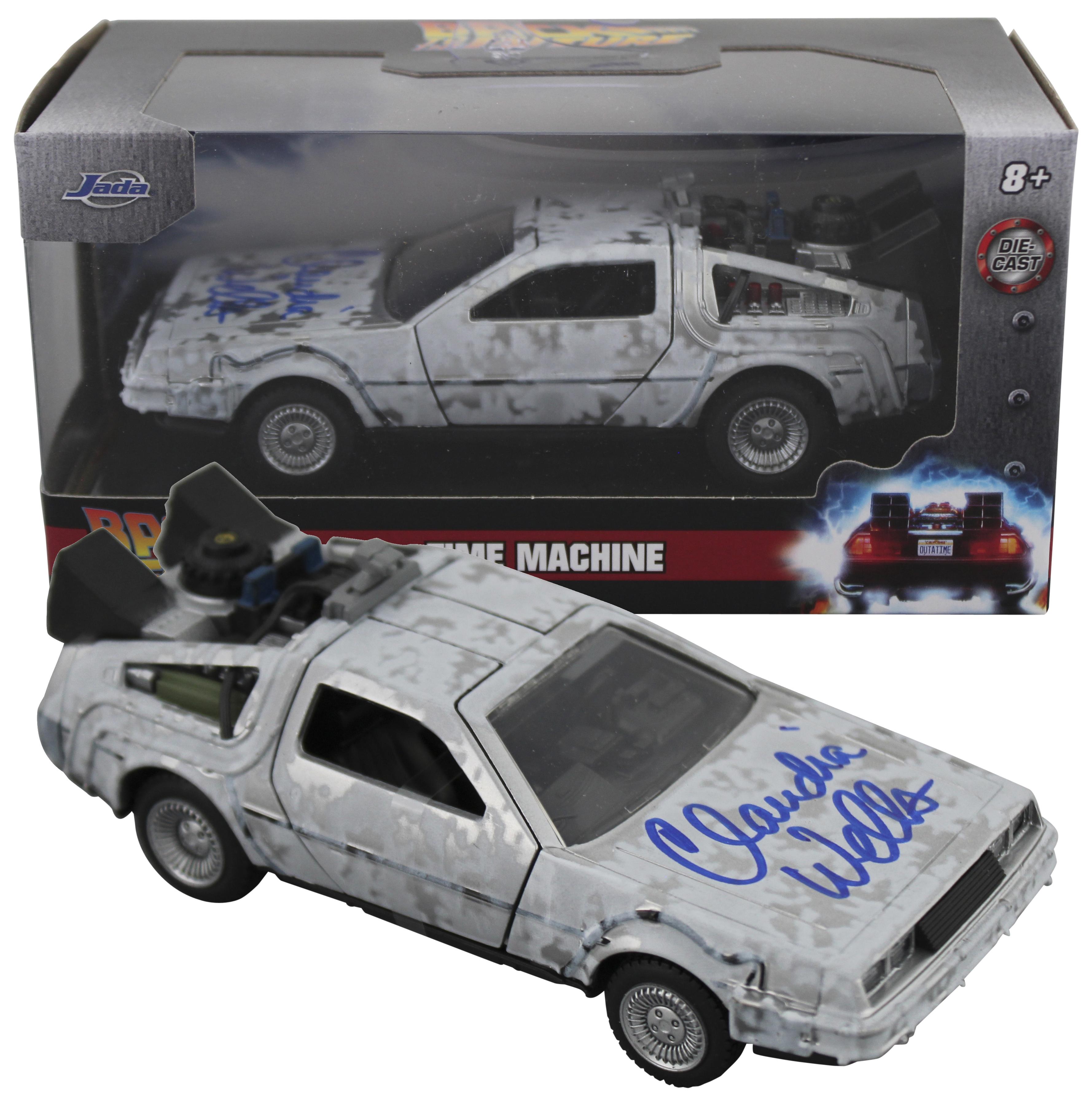 Claudia Wells Signed "Back to the Future" DeLorean Time Machine 1:32 Scale Die-Cast Car (Beckett) at PristineAuction.com Claudia Wells Signed "Back to the Future" DeLorean Time Machine 1:32 Scale Die-Cast Car (Beckett) at PristineAuction.com