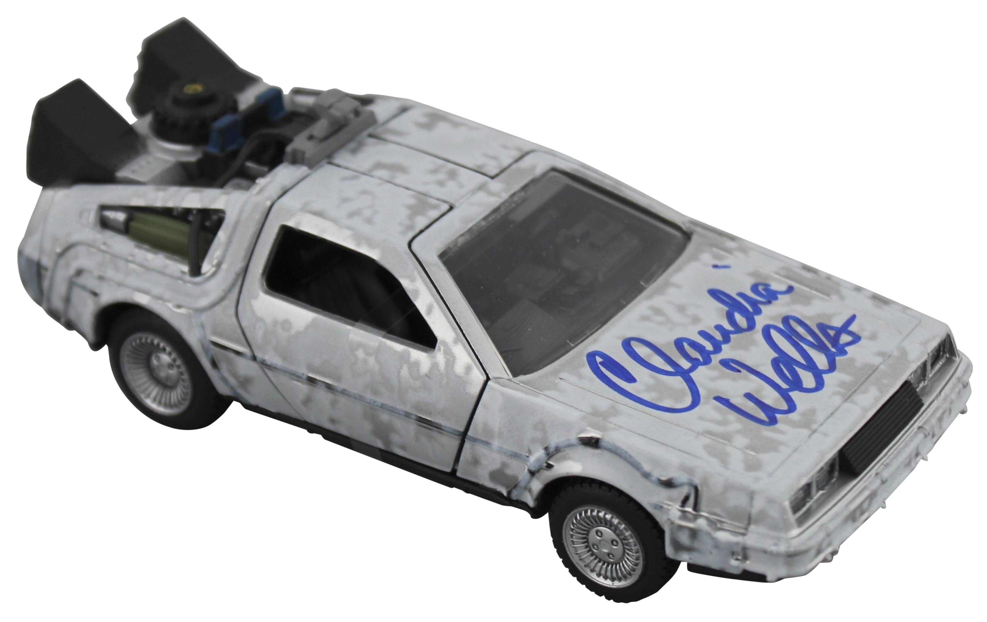 Claudia Wells Signed "Back to the Future" DeLorean Time Machine 1:32 Scale Die-Cast Car (Beckett) at PristineAuction.com Claudia Wells Signed "Back to the Future" DeLorean Time Machine 1:32 Scale Die-Cast Car (Beckett) at PristineAuction.com