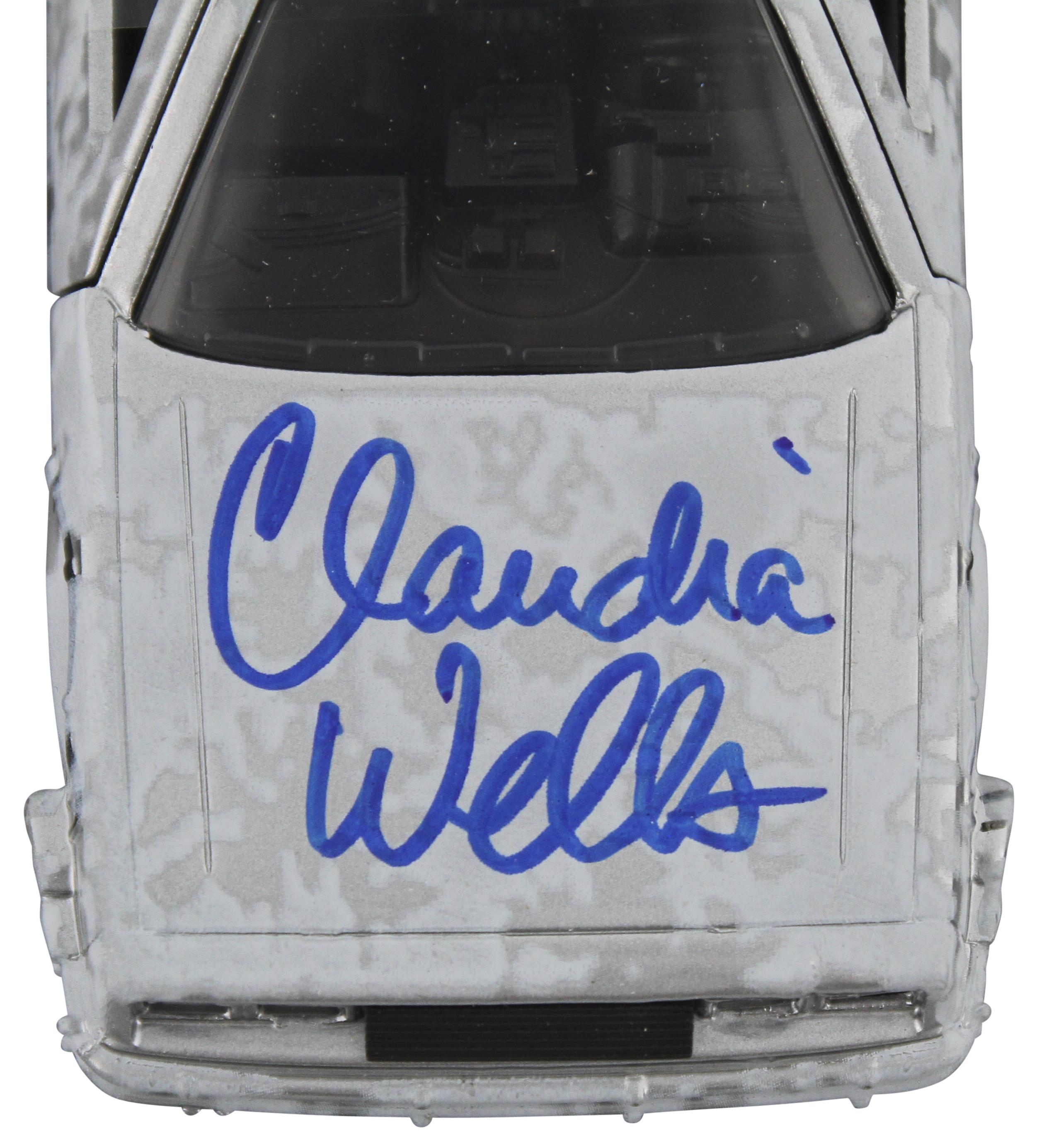 Claudia Wells Signed "Back to the Future" DeLorean Time Machine 1:32 Scale Die-Cast Car (Beckett) at PristineAuction.com Claudia Wells Signed "Back to the Future" DeLorean Time Machine 1:32 Scale Die-Cast Car (Beckett) at PristineAuction.com