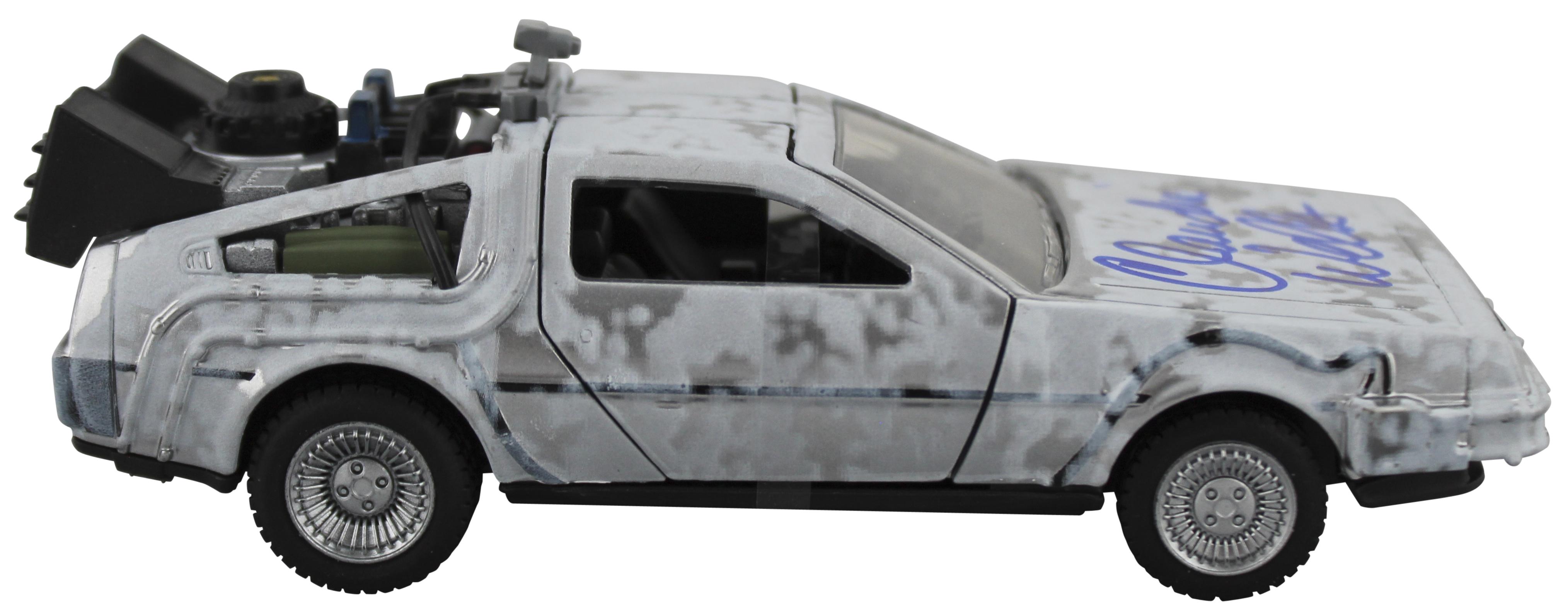 Claudia Wells Signed "Back to the Future" DeLorean Time Machine 1:32 Scale Die-Cast Car (Beckett) at PristineAuction.com Claudia Wells Signed "Back to the Future" DeLorean Time Machine 1:32 Scale Die-Cast Car (Beckett) at PristineAuction.com