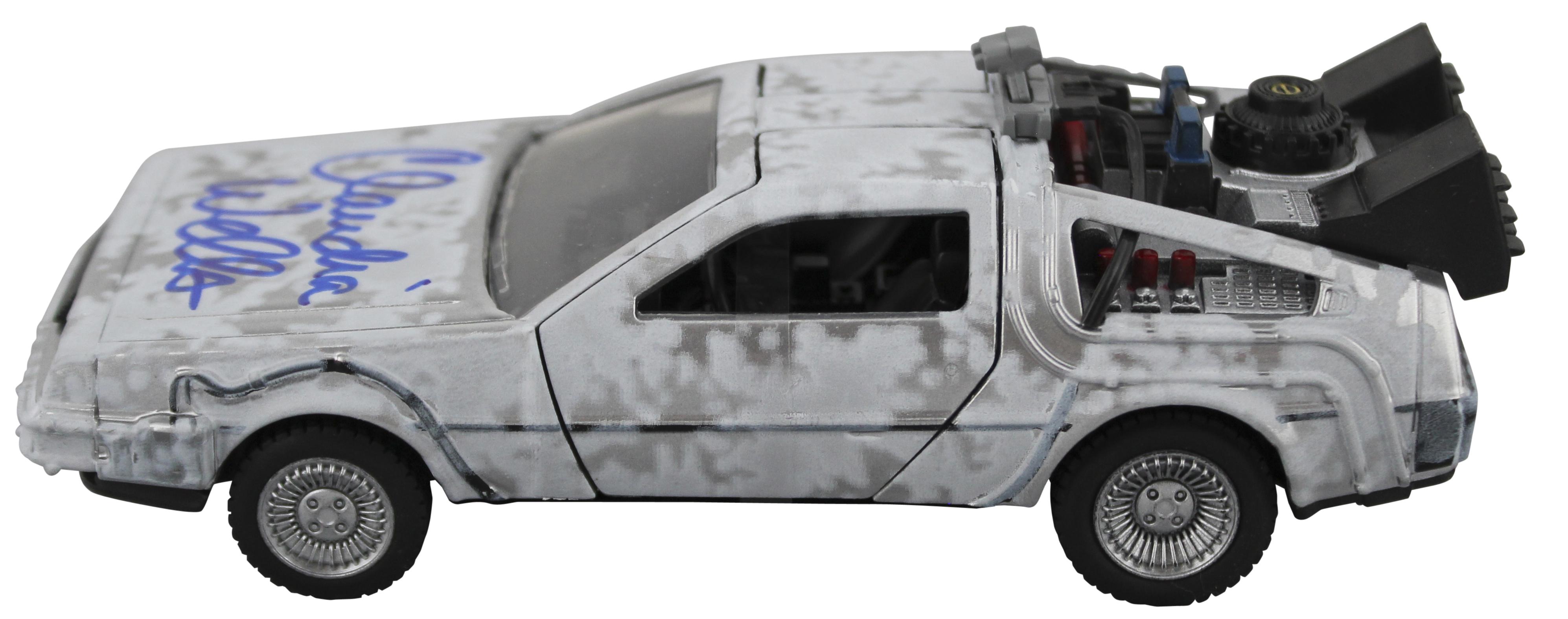 Claudia Wells Signed "Back to the Future" DeLorean Time Machine 1:32 Scale Die-Cast Car (Beckett) at PristineAuction.com Claudia Wells Signed "Back to the Future" DeLorean Time Machine 1:32 Scale Die-Cast Car (Beckett) at PristineAuction.com