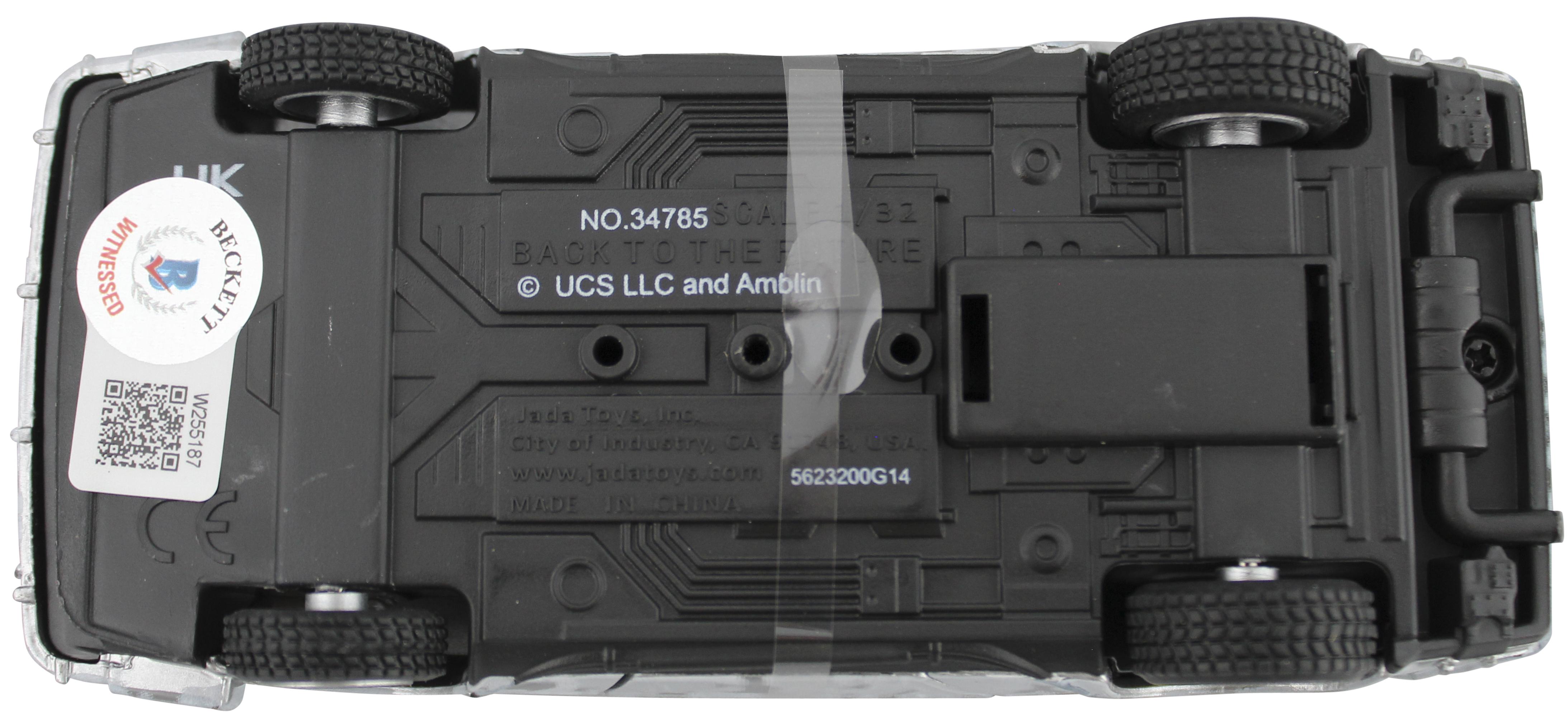 Claudia Wells Signed "Back to the Future" DeLorean Time Machine 1:32 Scale Die-Cast Car (Beckett) at PristineAuction.com Claudia Wells Signed "Back to the Future" DeLorean Time Machine 1:32 Scale Die-Cast Car (Beckett) at PristineAuction.com