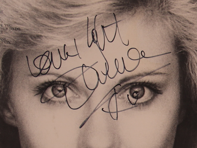 Olivia Newton-John Signed "John's Greatest Hits" Vinyl Record Album Sleeve With Record Inscribed "Love" (JSA) at PristineAuction.com Olivia Newton-John Signed "John's Greatest Hits" Vinyl Record Album Sleeve With Record Inscribed "Love" (JSA) at PristineAuction.com
