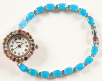 New 11 CTW Opal & Multi Gemstone Quartz Watch | Estimate Retail Value $1,900 (UGL) at PristineAuction.com