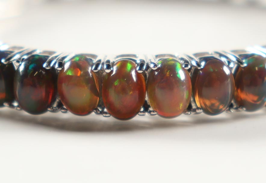 New 10 CTW Black Opal Bracelet | Estimate Retail Value $2,650 (UGL) at PristineAuction.com New 10 CTW Black Opal Bracelet | Estimate Retail Value $2,650 (UGL) at PristineAuction.com