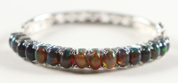 New 10 CTW Black Opal Bracelet | Estimate Retail Value $2,650 (UGL) at PristineAuction.com