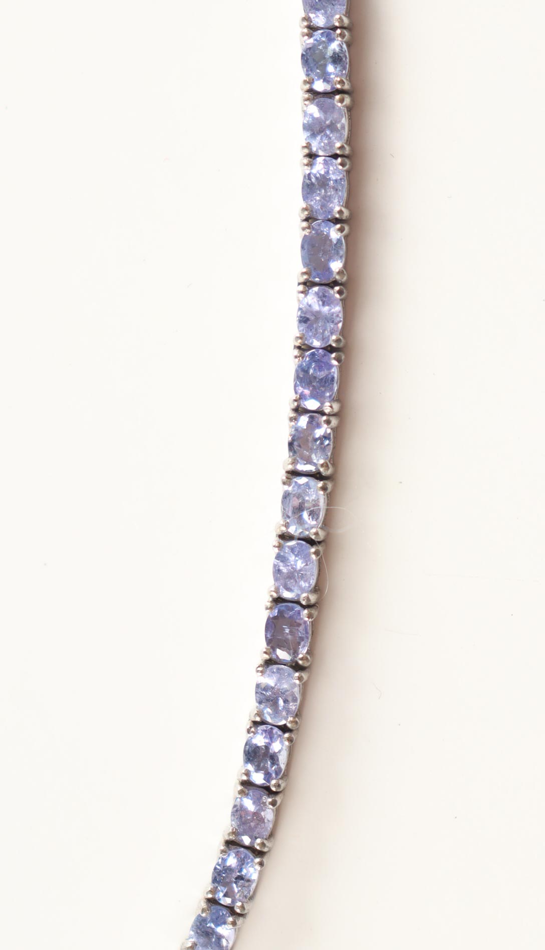 New 21 CTW Tanzanite Necklace | Estimated Retail Value: $2,725 (UGL) at PristineAuction.com New 21 CTW Tanzanite Necklace | Estimated Retail Value: $2,725 (UGL) at PristineAuction.com