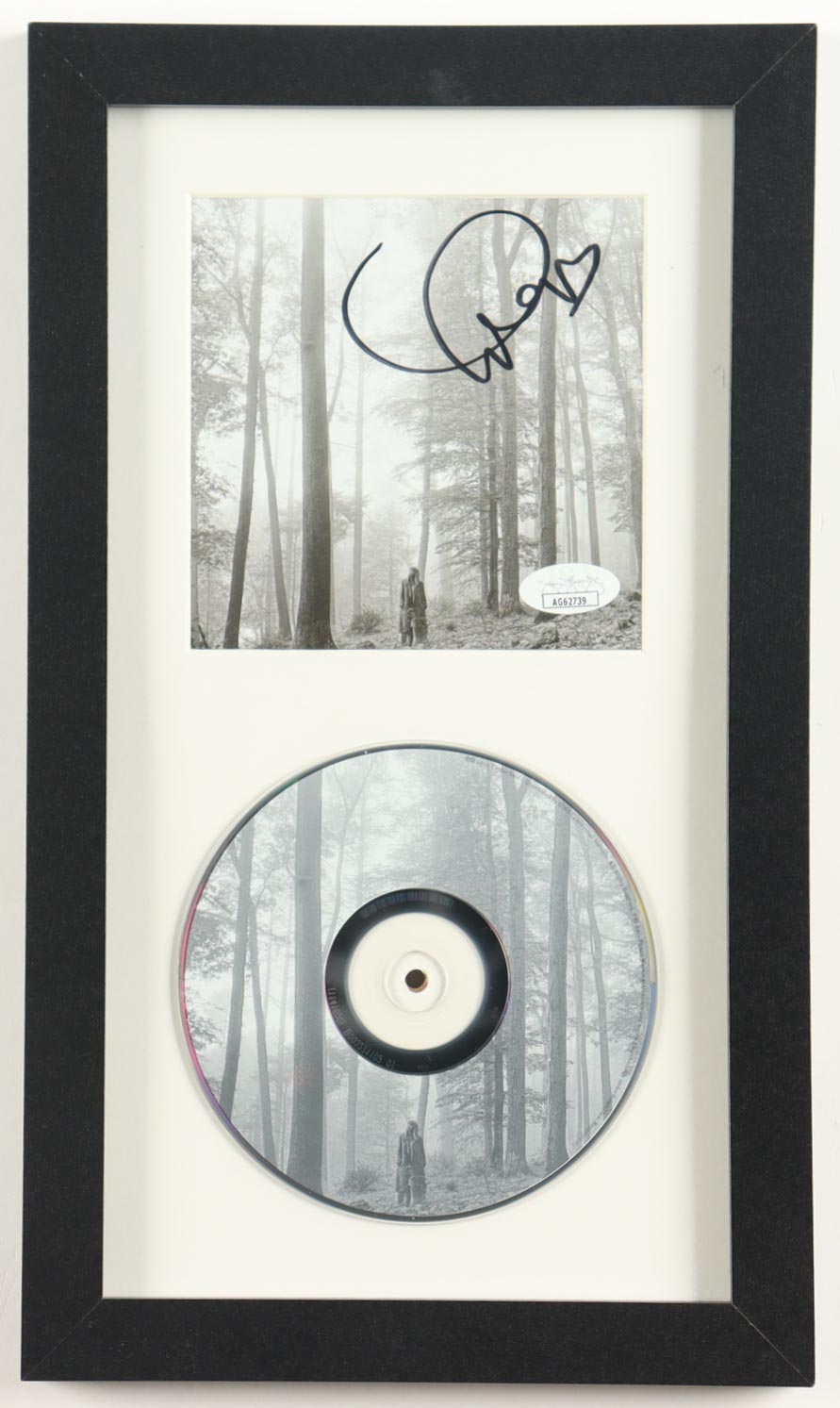 Taylor Swift Signed Custom Framed "Folklore" CD Album Insert Display with Disc (JSA) at PristineAuction.com Taylor Swift Signed Custom Framed "Folklore" CD Album Insert Display with Disc (JSA) at PristineAuction.com