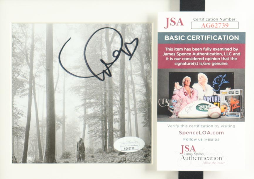 Taylor Swift Signed Custom Framed "Folklore" CD Album Insert Display with Disc (JSA) at PristineAuction.com Taylor Swift Signed Custom Framed "Folklore" CD Album Insert Display with Disc (JSA) at PristineAuction.com