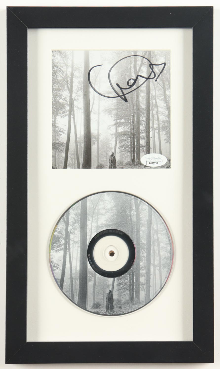 Taylor Swift Signed Custom Framed "Folklore" CD Album Insert Display with Disc (JSA) at PristineAuction.com Taylor Swift Signed Custom Framed "Folklore" CD Album Insert Display with Disc (JSA) at PristineAuction.com