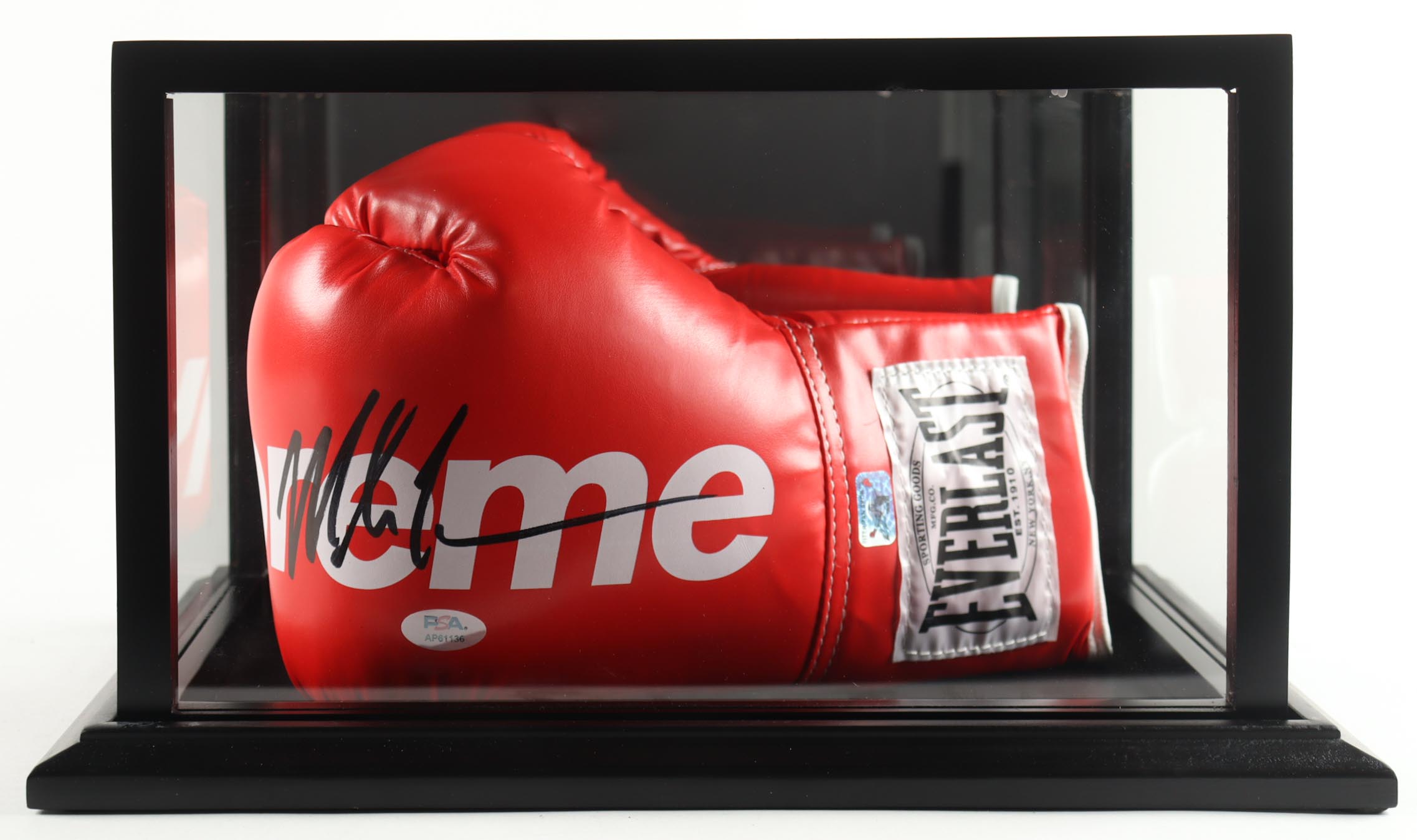 Mike Tyson Signed Everlast Supreme Boxing Glove with Wood Display Case (Tyson & PSA) at PristineAuction.com Mike Tyson Signed Everlast Supreme Boxing Glove with Wood Display Case (Tyson & PSA) at PristineAuction.com
