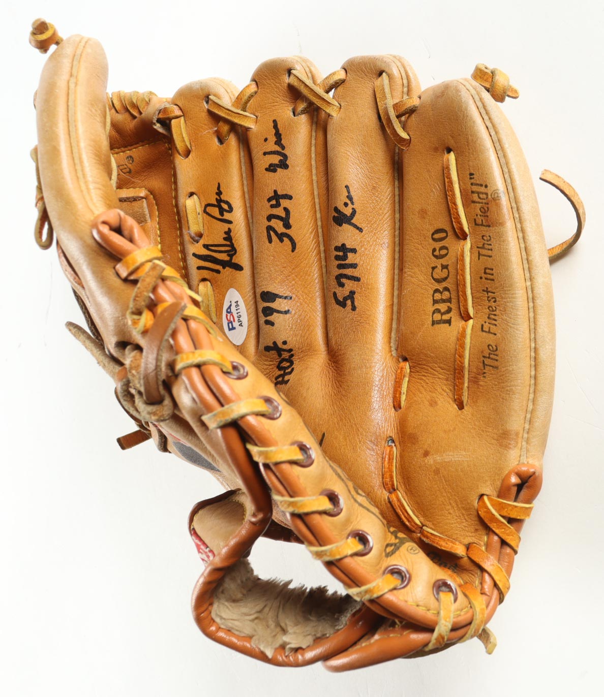 Nolan Ryan Signed Rawlings Glove Inscribed "HOF '99 / 5,714 Ks / 324 Wins" with Display Case (PSA) at PristineAuction.com Nolan Ryan Signed Rawlings Glove Inscribed "HOF '99 / 5,714 Ks / 324 Wins" with Display Case (PSA) at PristineAuction.com