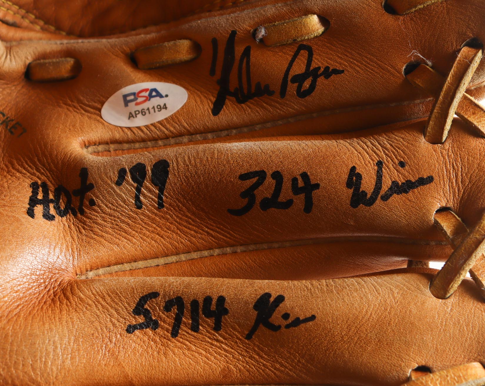 Nolan Ryan Signed Rawlings Glove Inscribed "HOF '99 / 5,714 Ks / 324 Wins" with Display Case (PSA) at PristineAuction.com Nolan Ryan Signed Rawlings Glove Inscribed "HOF '99 / 5,714 Ks / 324 Wins" with Display Case (PSA) at PristineAuction.com