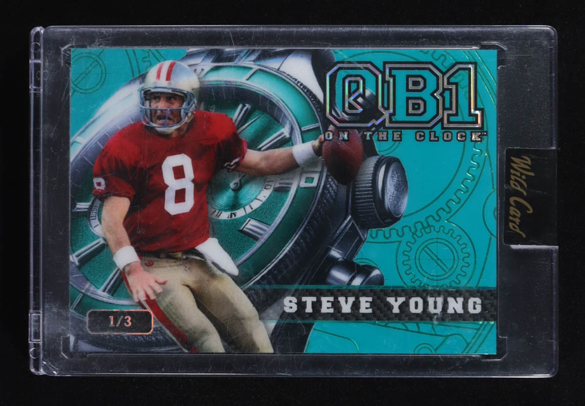 Steve Young 2024 Wild Card QB1 On The Clock Teal Rainbow Foil #OCW-TL-SY1 #1/3 at PristineAuction.com Steve Young 2024 Wild Card QB1 On The Clock Teal Rainbow Foil #OCW-TL-SY1 #1/3 at PristineAuction.com