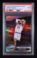 LeBron James 2023-24 Hoops Premium Stock Attack the Rack Silver Prizm #4 (PSA 9) at PristineAuction.com