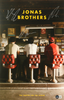 Jonas Brothers 11x17 Poster Signed by Joe, Kevin & Nick Jonas (Beckett) at PristineAuction.com