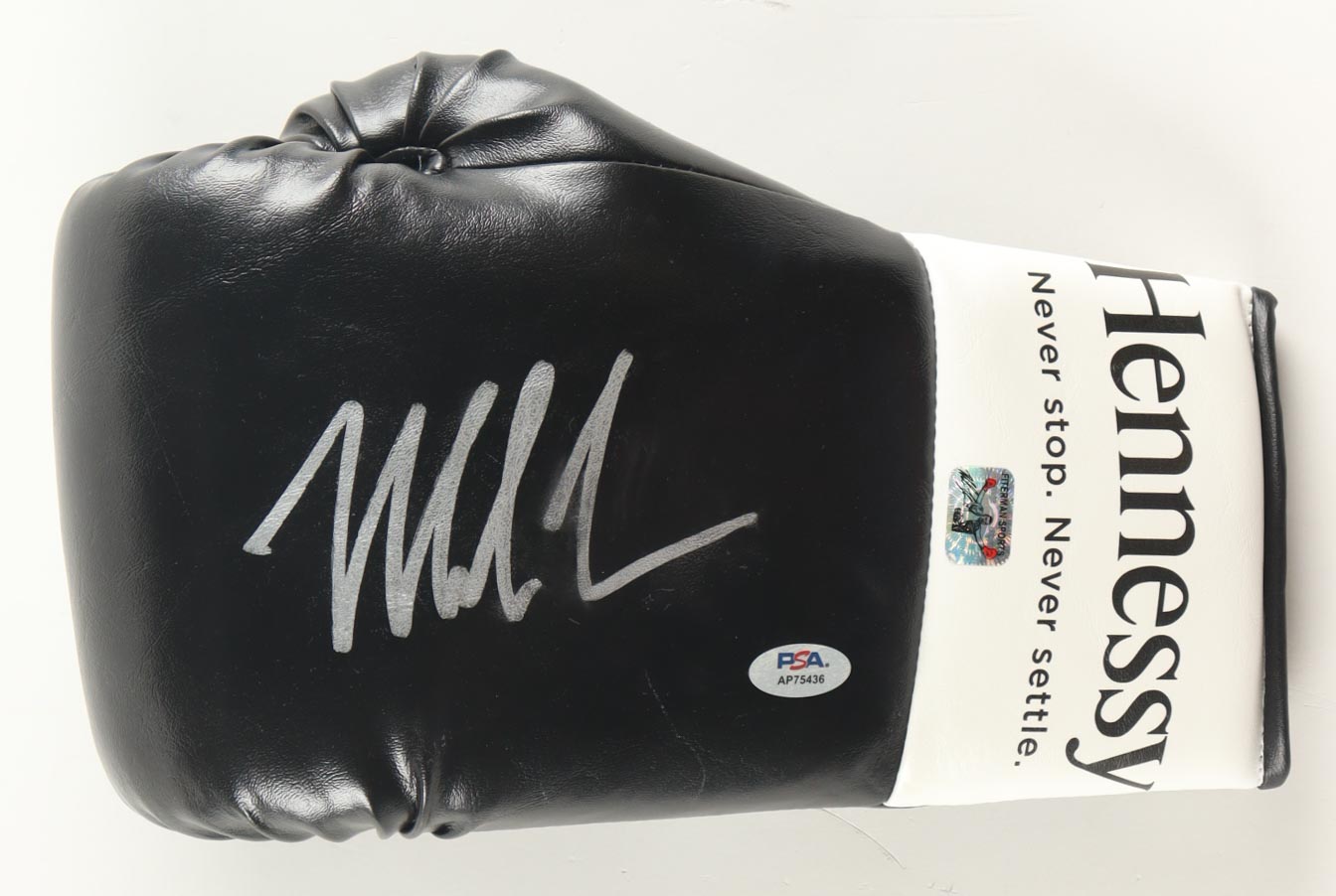 Mike Tyson Signed Hennessy Sponsor Boxing Glove With Title Plaque Display Stand (PSA & Tyson) at PristineAuction.com Mike Tyson Signed Hennessy Sponsor Boxing Glove With Title Plaque Display Stand (PSA & Tyson) at PristineAuction.com