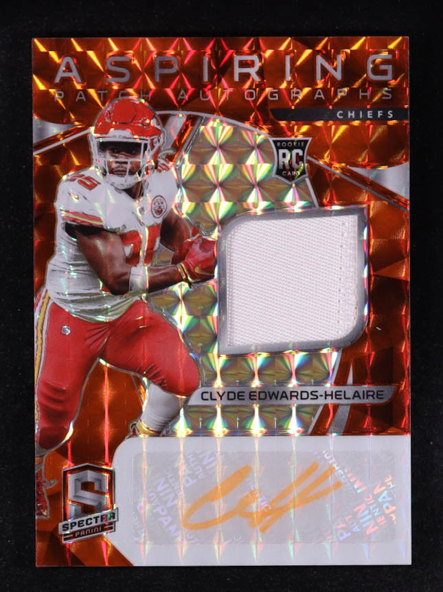 Clyde Edwards-Helaire 2020 Panini Spectra Aspiring Patch Autographs Neon Orange #11 #04/15 EXCH RC at PristineAuction.com Clyde Edwards-Helaire 2020 Panini Spectra Aspiring Patch Autographs Neon Orange #11 #04/15 EXCH RC at PristineAuction.com
