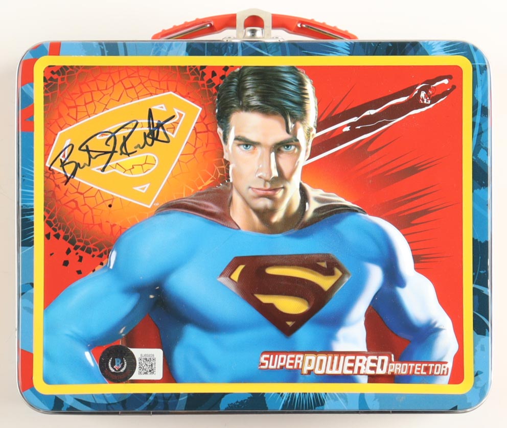 Brandon Routh Signed Metal Lunchbox With "Superman Returns" DVD & Superman: Enemy Mine/Cover Anthology Paperback Book (Celebrity Authentics & Beckett) at PristineAuction.com Brandon Routh Signed Metal Lunchbox With "Superman Returns" DVD & Superman: Enemy Mine/Cover Anthology Paperback Book (Celebrity Authentics & Beckett) at PristineAuction.com