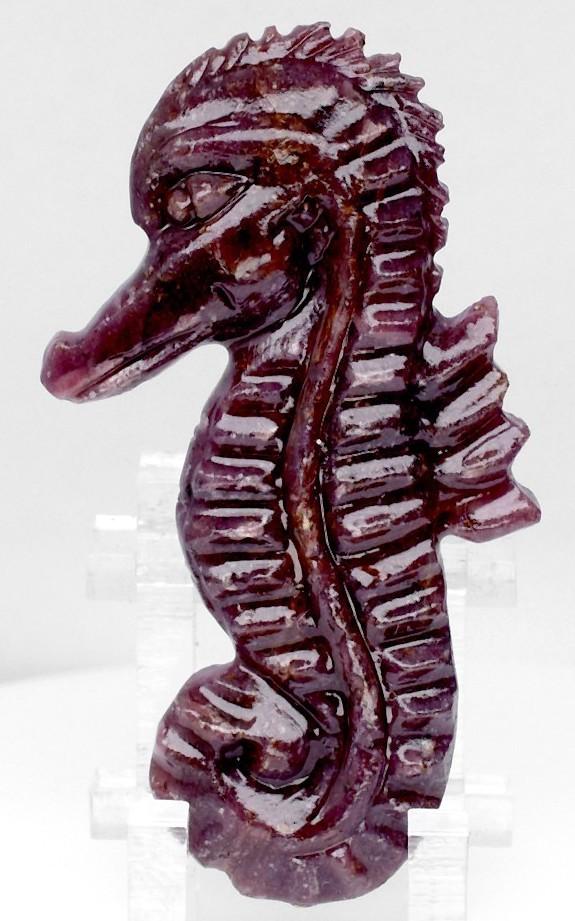 69.25 Carats Loose Ruby Carved Seahorse | Estimated Retail Value $1,950 (UGL) at PristineAuction.com 69.25 Carats Loose Ruby Carved Seahorse | Estimated Retail Value $1,950 (UGL) at PristineAuction.com