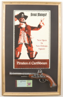 Disney's Disneyland Pirates of the Caribbean Custom Framed Photo Display with A-E Ticket Book & Toy Pistol at PristineAuction.com