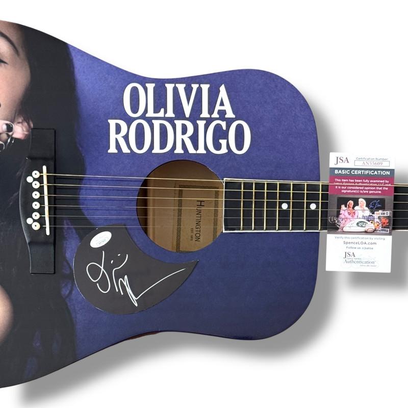 Olivia Rodrigo Signed Custom "GUTS" Huntington Acoustic Guitar (JSA) at PristineAuction.com Olivia Rodrigo Signed Custom "GUTS" Huntington Acoustic Guitar (JSA) at PristineAuction.com