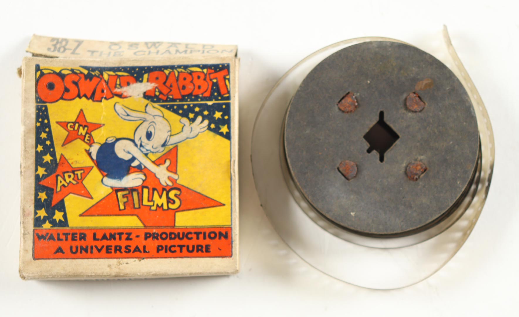 Oswald The Rabbit 1940 Disney Vintage 8MM Film with Original Packaging in Glass Display Case at PristineAuction.com Oswald The Rabbit 1940 Disney Vintage 8MM Film with Original Packaging in Glass Display Case at PristineAuction.com