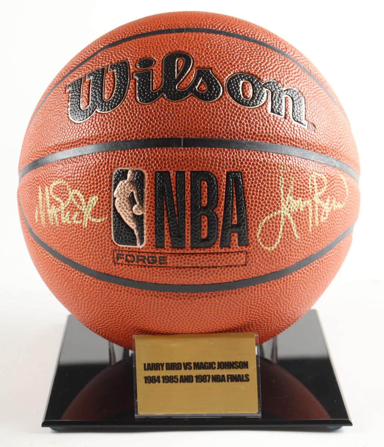 Larry Bird & Magic Johnson Signed Basketball With Acrylic Display Stand (Beckett) at PristineAuction.com Larry Bird & Magic Johnson Signed Basketball With Acrylic Display Stand (Beckett) at PristineAuction.com