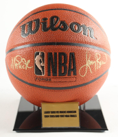 Larry Bird & Magic Johnson Signed Basketball With Acrylic Display Stand (Beckett) at PristineAuction.com
