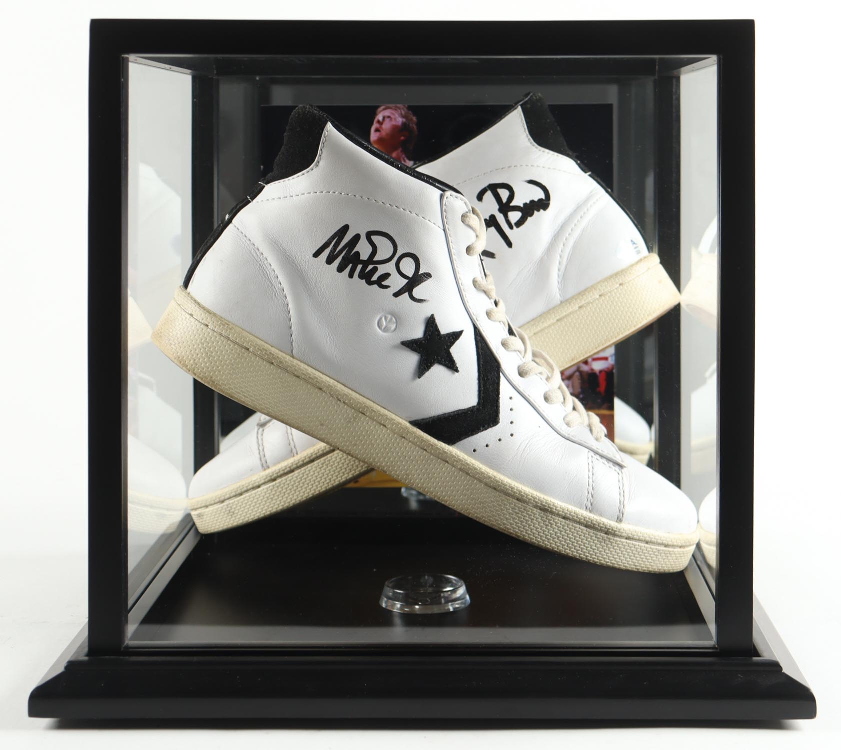 Magic Johnson & Larry Bird Signed Pair of (2) Converse All Star Leather Basketball Shoes with Photo Display Case (Beckett & PSA) at PristineAuction.com Magic Johnson & Larry Bird Signed Pair of (2) Converse All Star Leather Basketball Shoes with Photo Display Case (Beckett & PSA) at PristineAuction.com