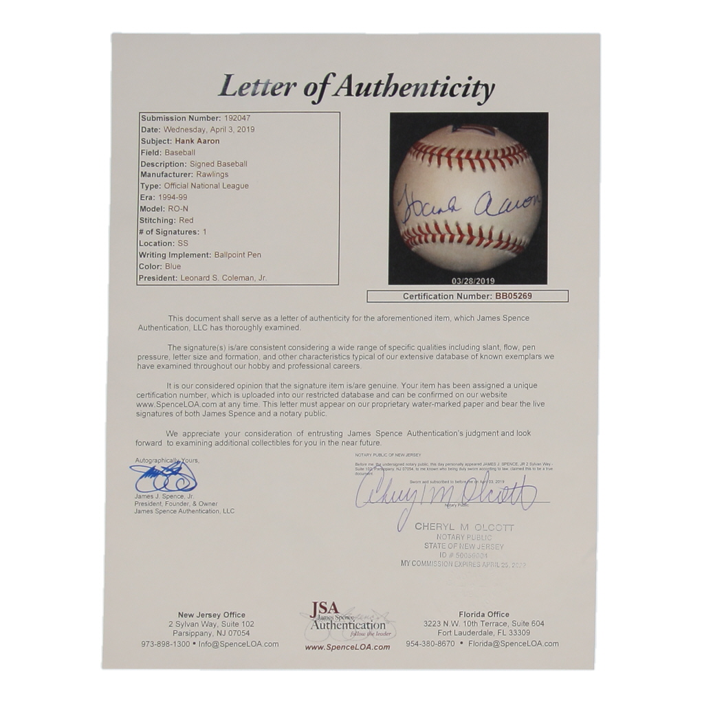 Hank Aaron Signed ONL 715 25th Anniversary Logo Baseball with Postal Stamp (JSA) at PristineAuction.com Hank Aaron Signed ONL 715 25th Anniversary Logo Baseball with Postal Stamp (JSA) at PristineAuction.com