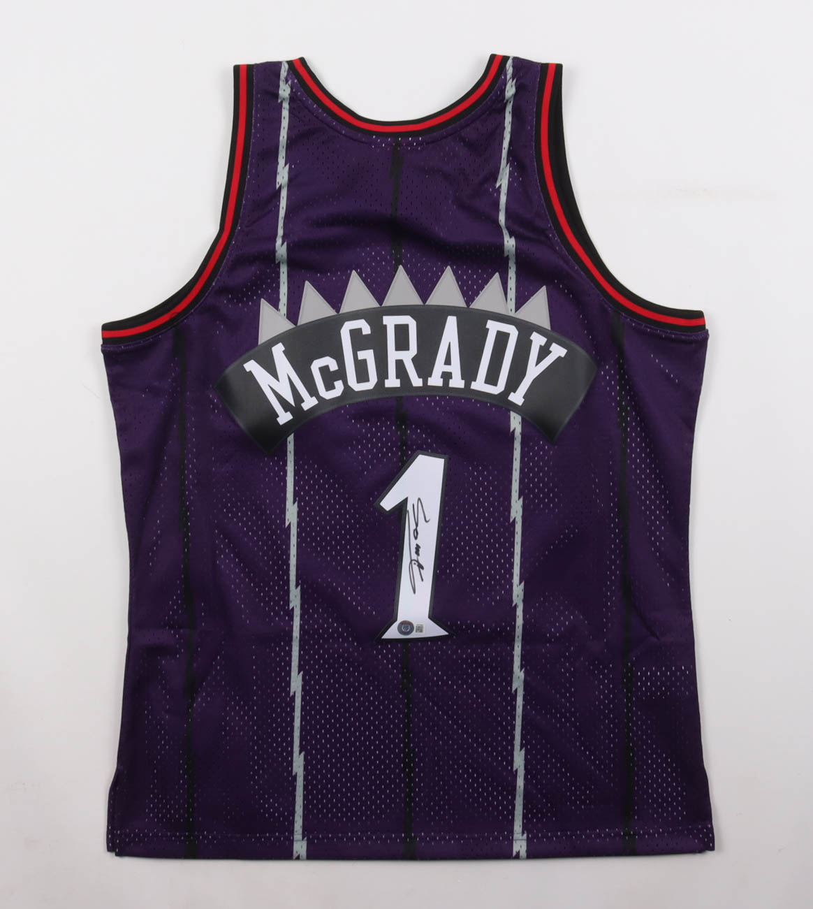 Tracy McGrady Signed Raptors Mitchell & Ness Authentic Jersey (Beckett) at PristineAuction.com Tracy McGrady Signed Raptors Mitchell & Ness Authentic Jersey (Beckett) at PristineAuction.com