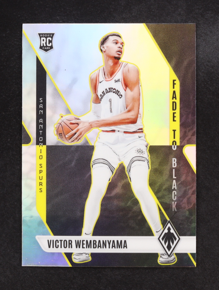 Victor Wembanyama 2023-24 Panini Phoenix Fade To Black Silver #11 RC at PristineAuction.com Victor Wembanyama 2023-24 Panini Phoenix Fade To Black Silver #11 RC at PristineAuction.com