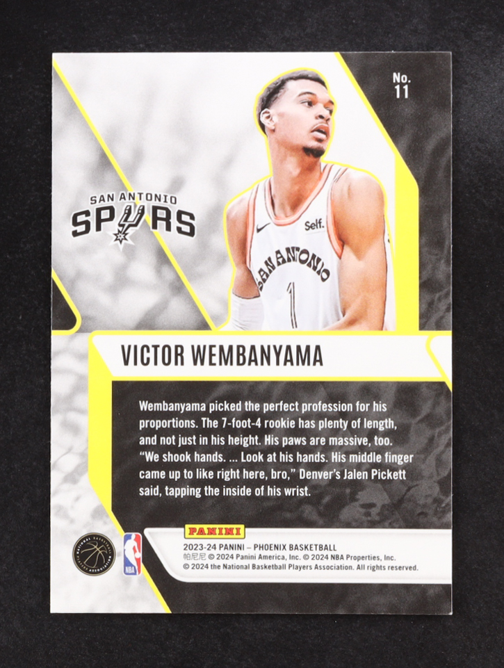Victor Wembanyama 2023-24 Panini Phoenix Fade To Black Silver #11 RC at PristineAuction.com Victor Wembanyama 2023-24 Panini Phoenix Fade To Black Silver #11 RC at PristineAuction.com