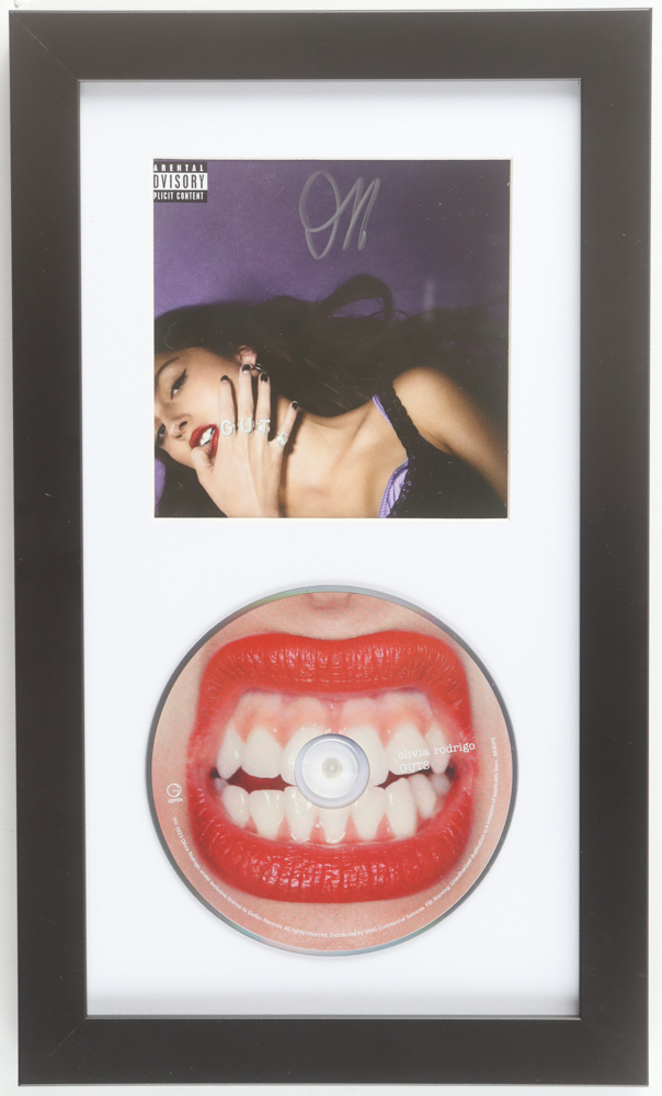 Olivia Rodrigo Signed Custom Framed "Guts" CD Album Insert Display with Disc (JSA) at PristineAuction.com Olivia Rodrigo Signed Custom Framed "Guts" CD Album Insert Display with Disc (JSA) at PristineAuction.com