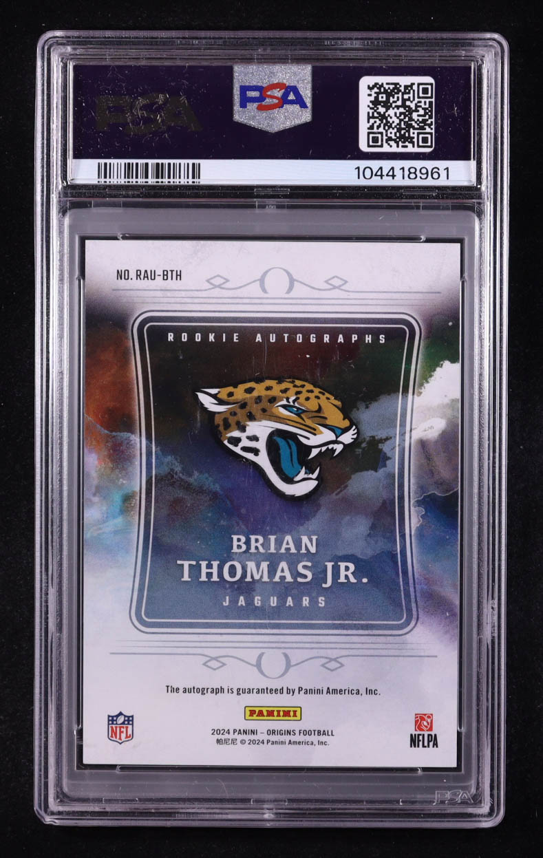 Brian Thomas Jr. 2024 Panini Origins Rookie Autographs Orange #15 RC #22/75 (PSA 9) at PristineAuction.com Brian Thomas Jr. 2024 Panini Origins Rookie Autographs Orange #15 RC #22/75 (PSA 9) at PristineAuction.com